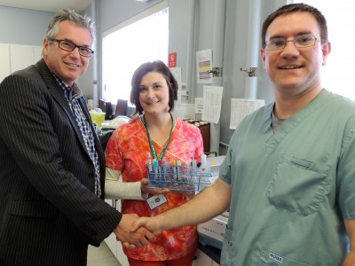 KDH CEO Colin Goodfellow (left) thanks lab staff Joanna Melesky and Jesse Trousdale for their efforts