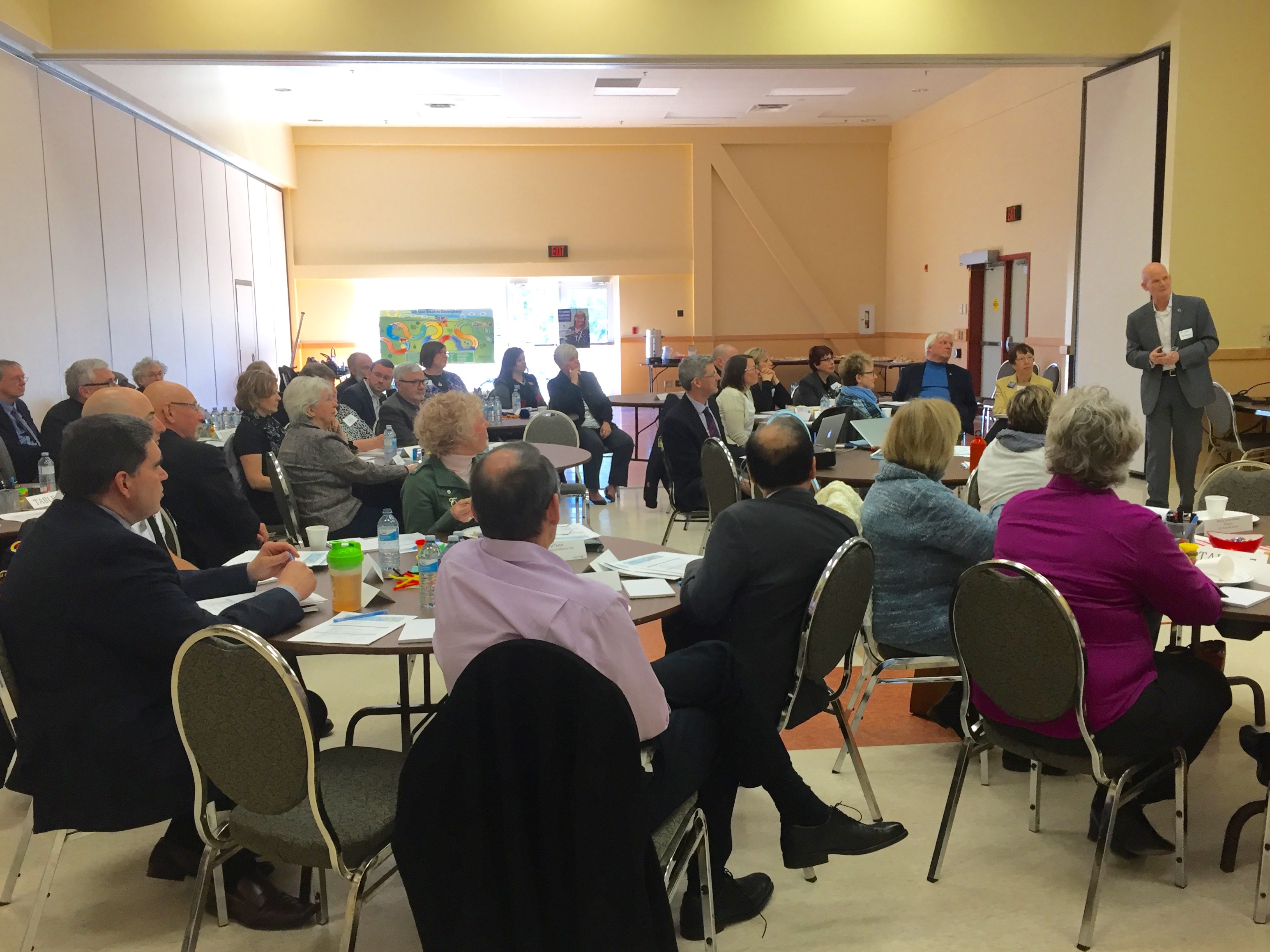CEO Frank Vassallo presents to large group